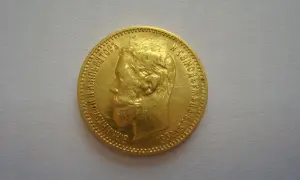 Złota moneta z profilem cara. Cena skupu 5 rubli.